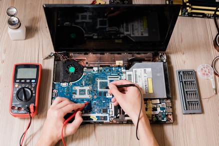 Image of a Laptop being repaired