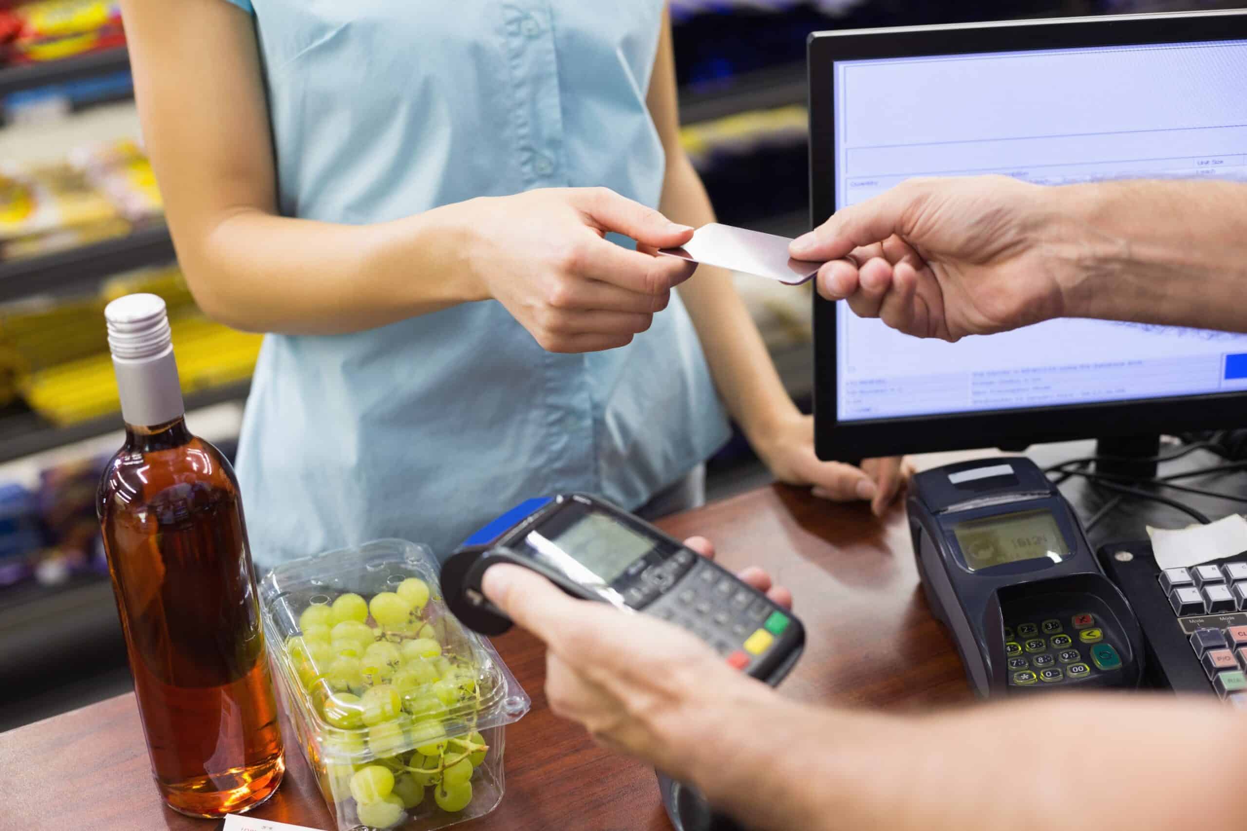 picture of retail till taking payment