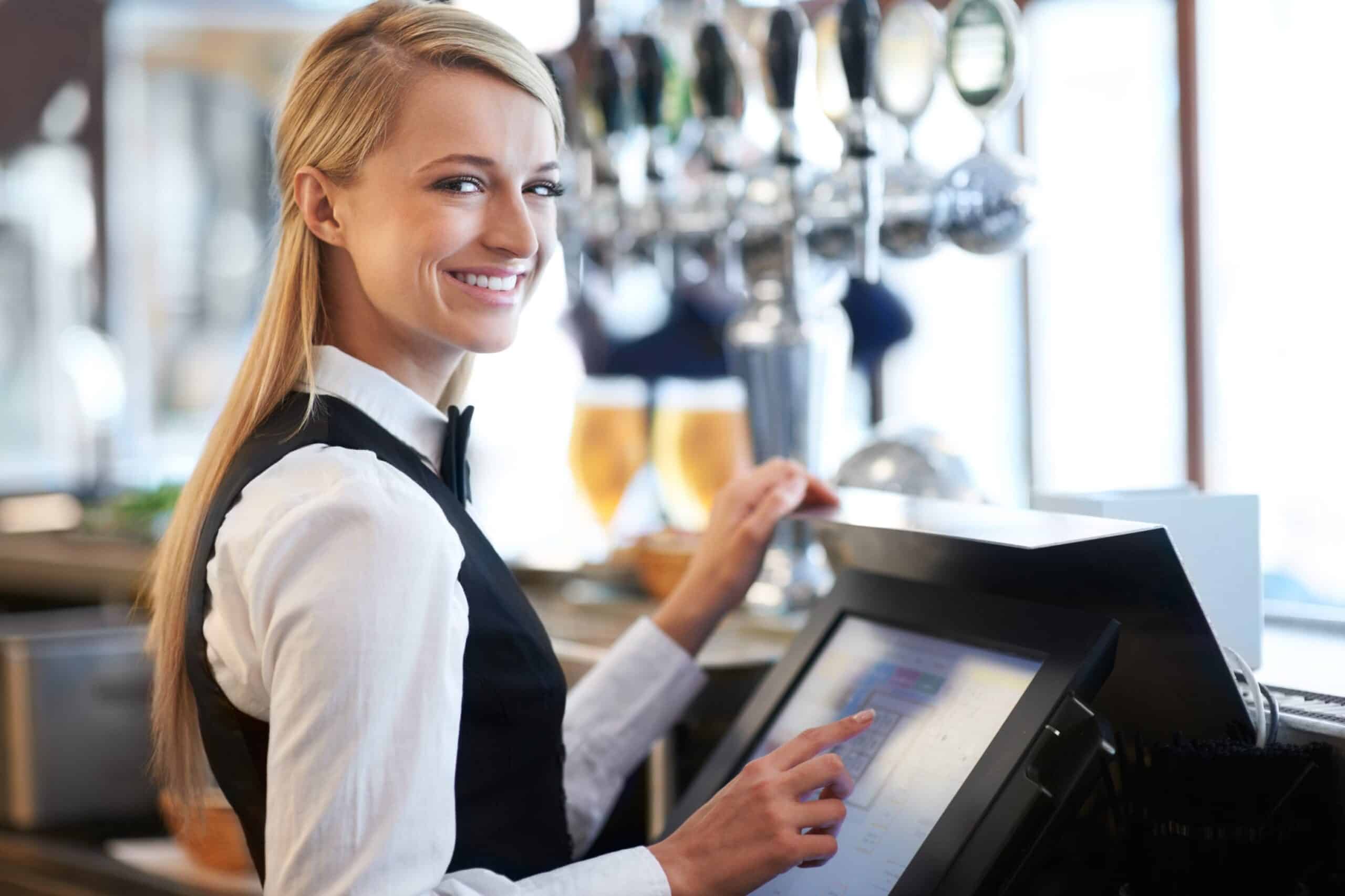 picture of lady using till at an event.
